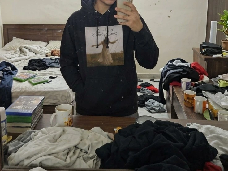 Domenic F. wearing his hoodie