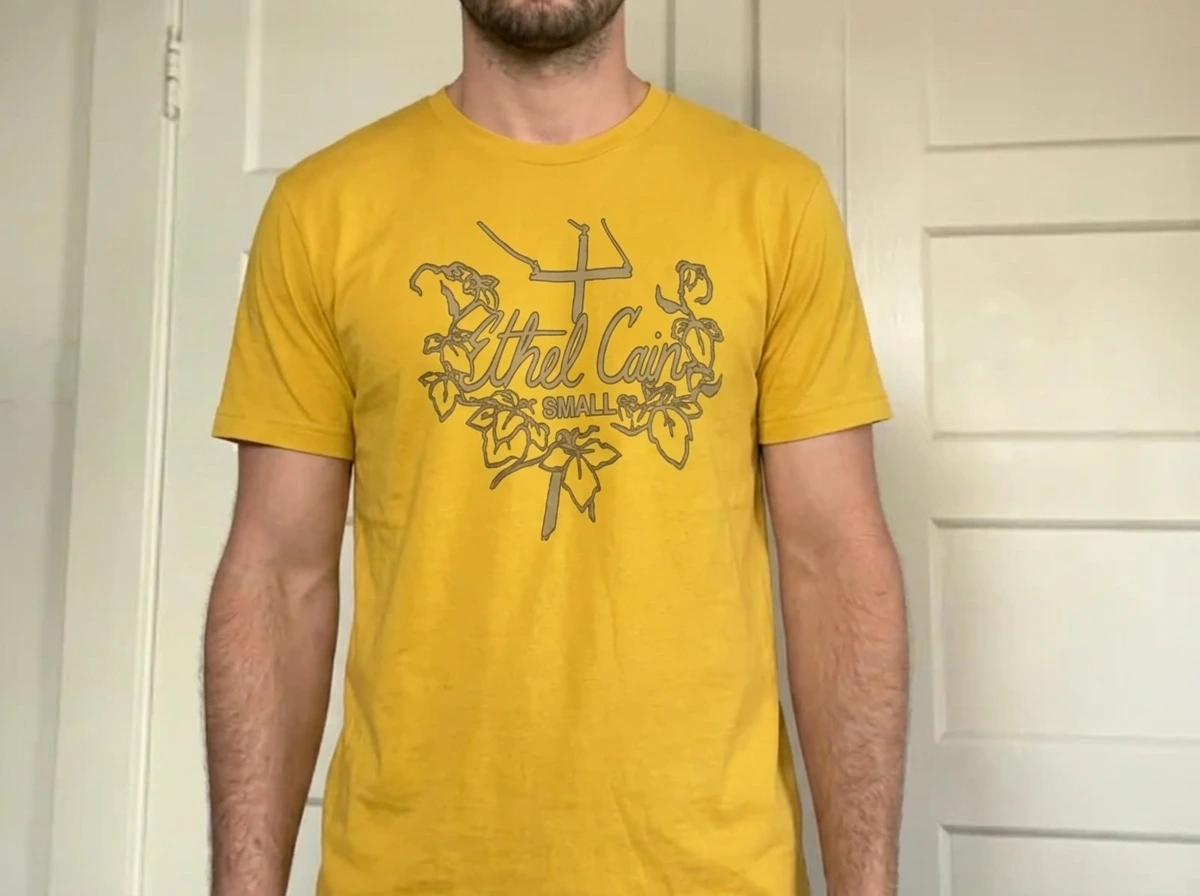 Arianni R. wearing a t-shirt